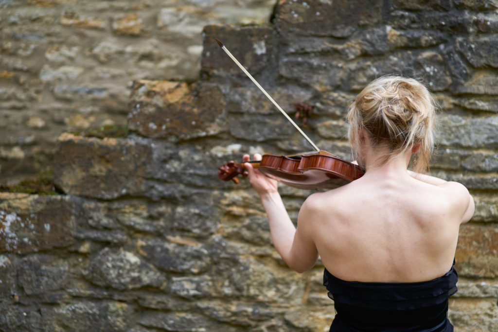 May Robertson from the back playing the baroque violin